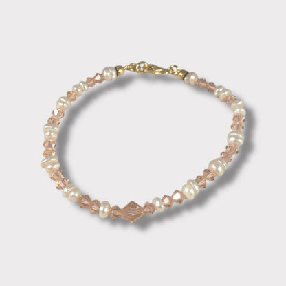 Bracciale con cristalli e perle di acqua dolce